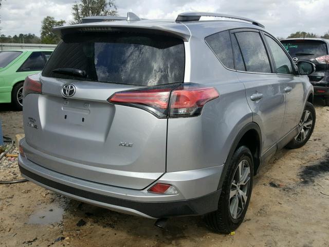 2T3WFREV8HW384022 - 2017 TOYOTA RAV4 XLE SILVER photo 4