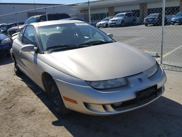 1G8ZR1274YZ148828 - 2000 SATURN SC2 TAN photo 1