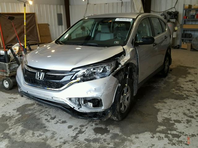 5J6RM4H3XGL128718 - 2016 HONDA CR-V LX SILVER photo 2