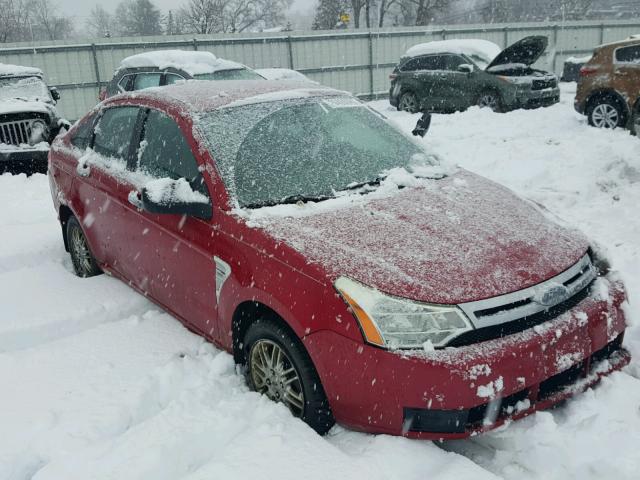 1FAHP35N39W134697 - 2009 FORD FOCUS SE RED photo 1