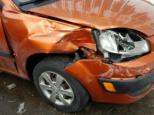 KNADE223796543827 - 2009 KIA RIO BASE ORANGE photo 9