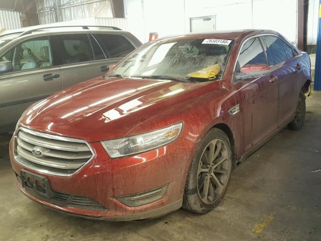 1FAHP2E87EG125641 - 2014 FORD TAURUS SEL RED photo 2