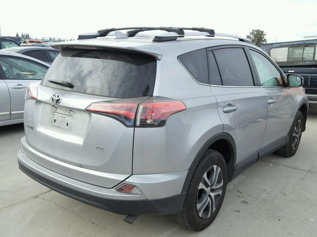 2T3ZFREV2GW245628 - 2016 TOYOTA RAV4 LE SILVER photo 4