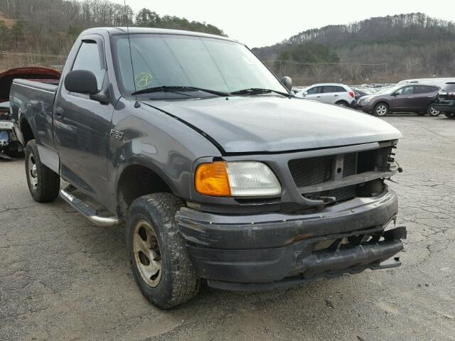 2FTRF18294CA83881 - 2004 FORD F-150 HERI GRAY photo 1