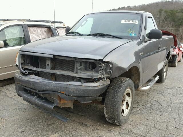 2FTRF18294CA83881 - 2004 FORD F-150 HERI GRAY photo 2