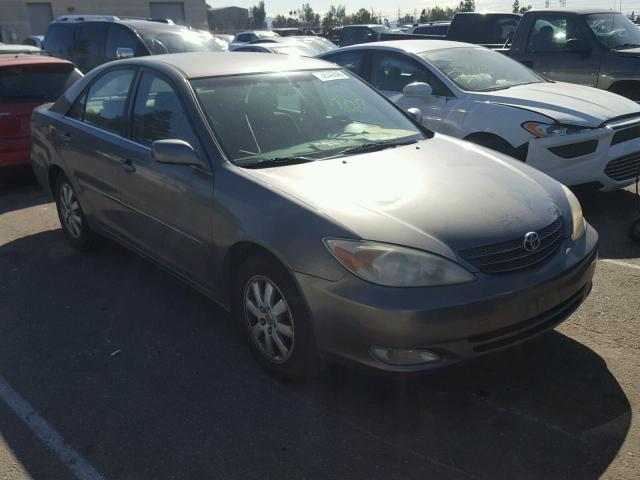 JTDBE30K930181052 - 2003 TOYOTA CAMRY LE GRAY photo 1