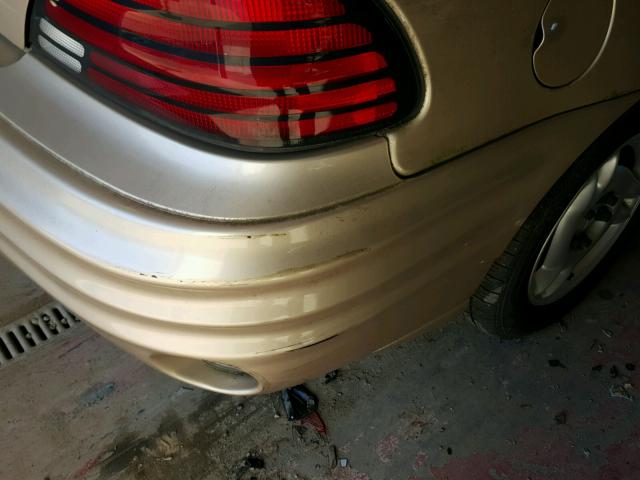 1G2NE12F42C179132 - 2002 PONTIAC GRAND AM S ოქროსფერი ფოტო 9