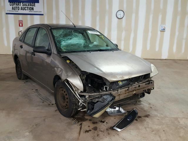 1FAFP34NX5W273437 - 2005 FORD FOCUS ZX4 TAN photo 1