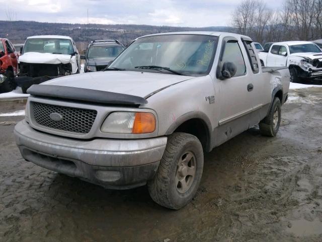 2FTRX18W54CA36072 - 2004 FORD F-150 HERI SILVER photo 2