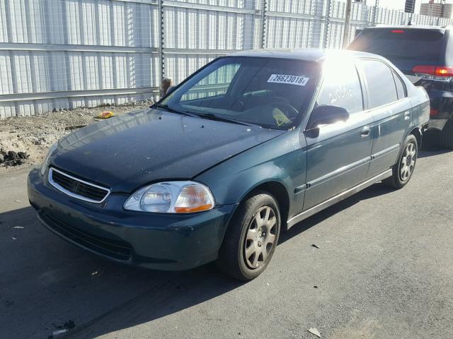 2HGEJ6572WH595788 - 1998 HONDA CIVIC LX GREEN photo 2