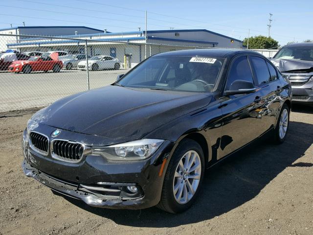 WBA8E1G59HNU14904 - 2017 BMW 320 I BLACK photo 2