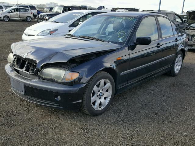 WBAAZ33434KP89634 - 2004 BMW 325 IS SUL BLACK photo 2