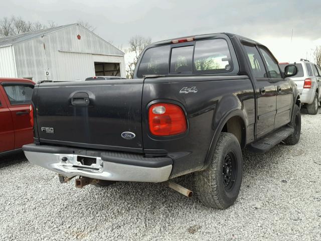 1FTRW08L91KE35349 - 2001 FORD F150 SUPER BLACK photo 4