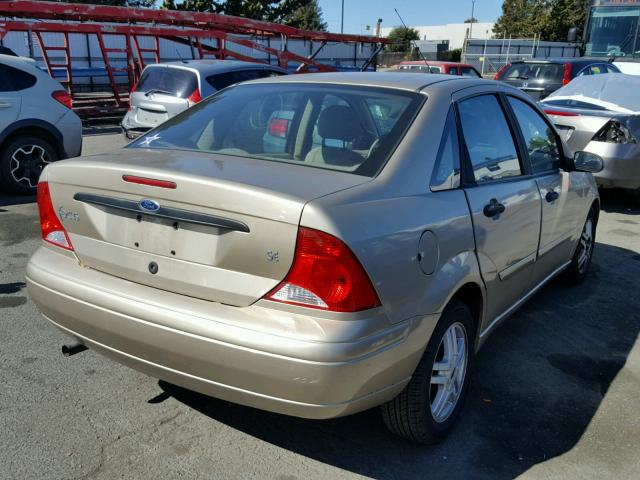 1FAFP34P3YW200657 - 2000 FORD FOCUS SE GOLD photo 4