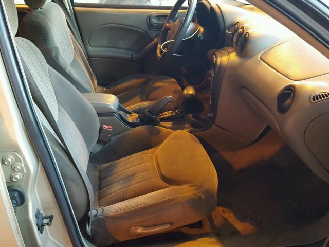 1G2NF52T01C142457 - 2001 PONTIAC GRAND AM S GOLD photo 5