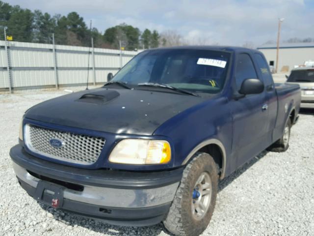 1FTZX1765WNB70725 - 1998 FORD F150 BLUE photo 2