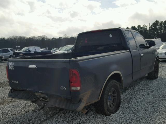 1FTZX1765WNB70725 - 1998 FORD F150 BLUE photo 4