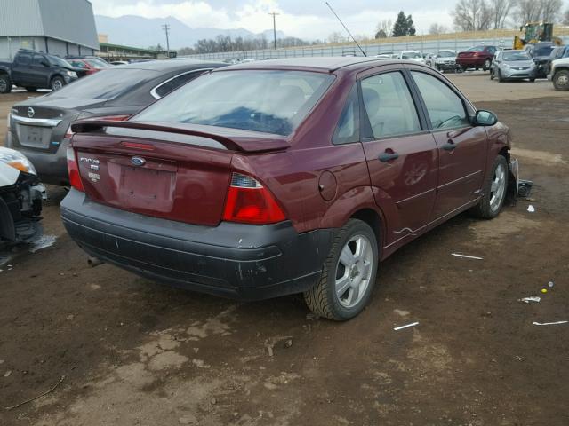 1FAFP34N97W235880 - 2007 FORD FOCUS ZX4 MAROON photo 4