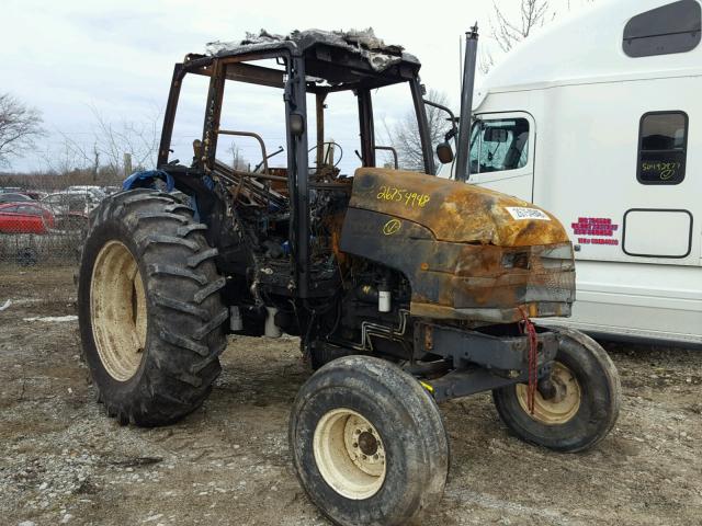 16028B - 2001 NEWH TRACTOR BLUE photo 1