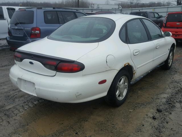 1FAFP53S3XA331861 - 1999 FORD TAURUS SE WHITE photo 4