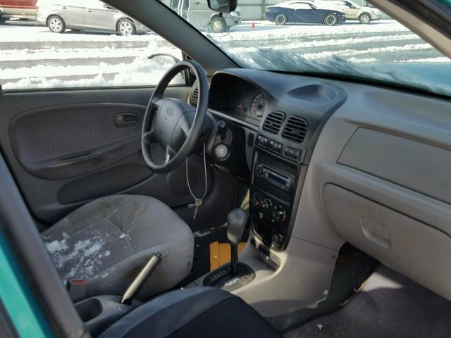 KNADC123116079793 - 2001 KIA RIO GREEN photo 9