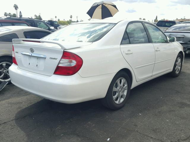 JTDBE32K440276990 - 2004 TOYOTA CAMRY LE WHITE photo 4