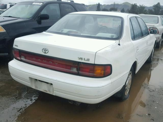 JT2GK12E3R0025004 - 1994 TOYOTA CAMRY LE WHITE photo 4