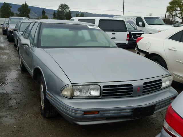 1G3HN52K1S4825220 - 1995 OLDSMOBILE 88 ROYALE GRAY photo 1