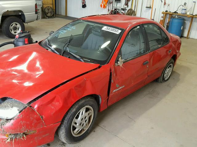 1G2JB5249X7518643 - 1999 PONTIAC SUNFIRE SE RED photo 9