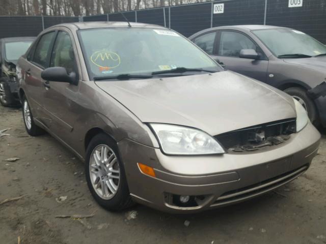 1FAFP34N65W206219 - 2005 FORD FOCUS ZX4 GOLD photo 1