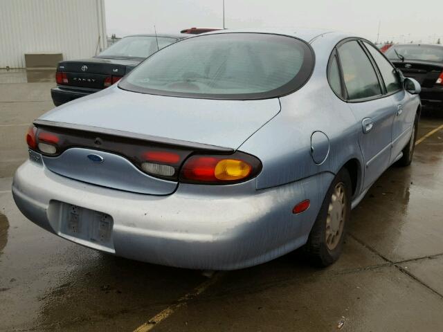 1FALP53S9VG251266 - 1997 FORD TAURUS LX BLUE photo 4