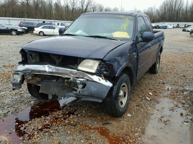 1FTRX18L0XNB27321 - 1999 FORD F150 BLUE photo 2