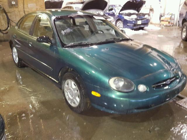 1FAFP53U0XG325496 - 1999 FORD TAURUS SE GREEN photo 1