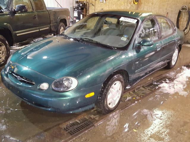 1FAFP53U0XG325496 - 1999 FORD TAURUS SE GREEN photo 2