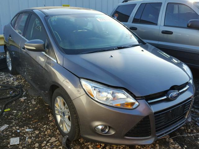 1FAHP3H2XCL201161 - 2012 FORD FOCUS SEL GRAY photo 1