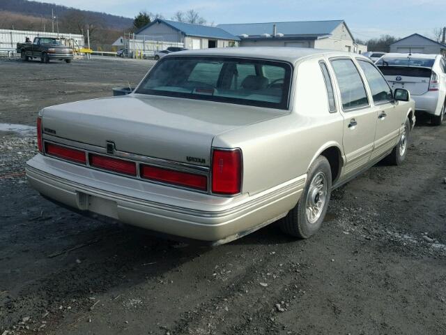 1LNLM81W3VY756395 - 1997 LINCOLN TOWN CAR E BEIGE photo 4