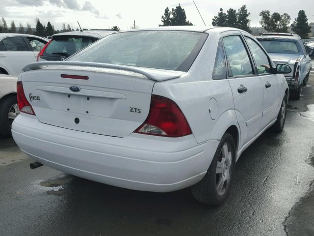 1FAFP38Z73W301818 - 2003 FORD FOCUS ZTS WHITE photo 4