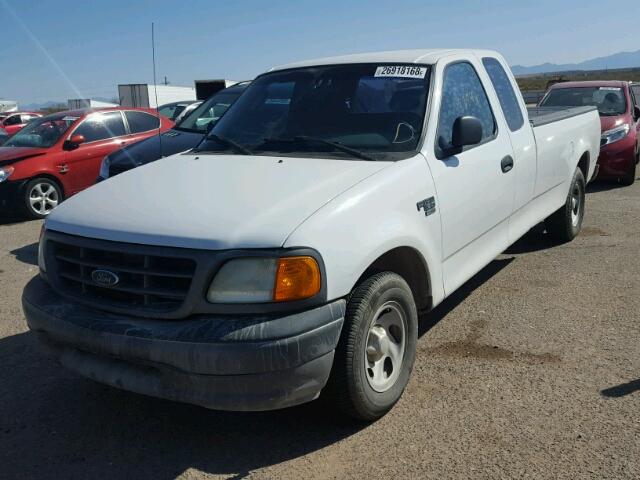 2FTRX17W64CA98792 - 2004 FORD F-150 HERI WHITE photo 2