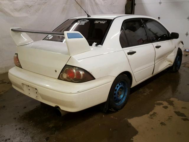 JA3AJ26E82U033967 - 2002 MITSUBISHI LANCER ES WHITE photo 4