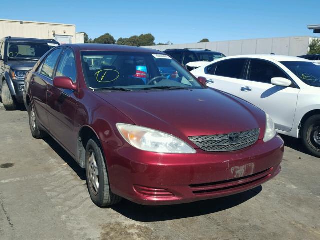 4T1BF30K82U004086 - 2002 TOYOTA CAMRY LE RED photo 1