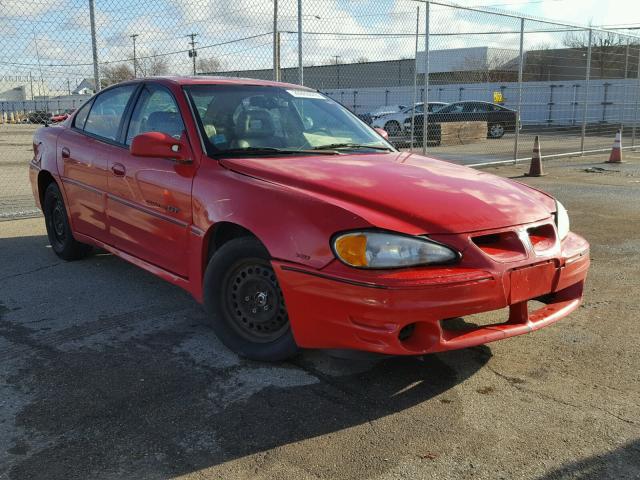 1G2NW52EXXM883140 - 1999 PONTIAC GRAND AM G RED photo 1