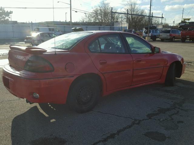 1G2NW52EXXM883140 - 1999 PONTIAC GRAND AM G RED photo 4