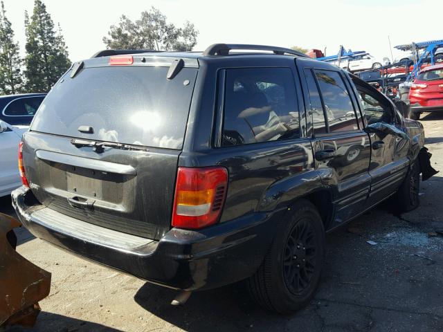 1J4GX58S04C159919 - 2004 JEEP GRAND CHER BLACK photo 4