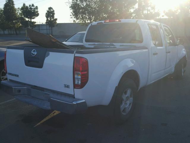 1N6AD09UX7C405609 - 2007 NISSAN FRONTIER C WHITE photo 4