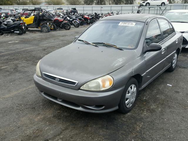 KNADC123216075333 - 2001 KIA RIO GRAY photo 2