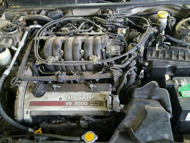 JN1CA31D9YT507828 - 2000 NISSAN MAXIMA GXE GOLD photo 7