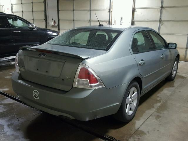 3FAHP07Z48R169054 - 2008 FORD FUSION SE GREEN photo 4