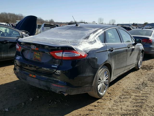 3FA6P0HD8GR366382 - 2016 FORD FUSION SE BLACK photo 4