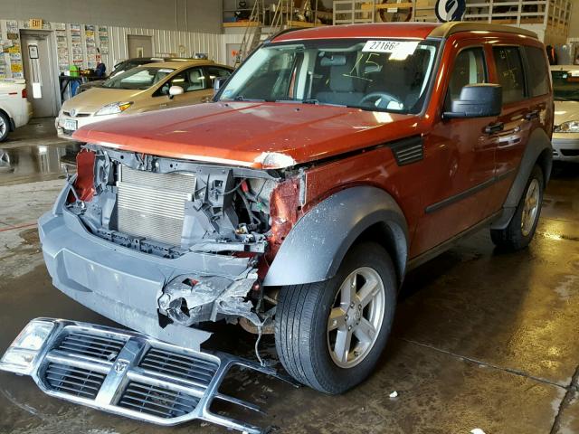 1D8GU28K07W713140 - 2007 DODGE NITRO SXT ORANGE photo 2