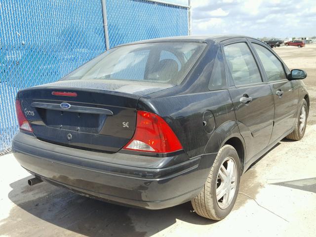 1FAFP34P61W117178 - 2001 FORD FOCUS SE BLACK photo 4